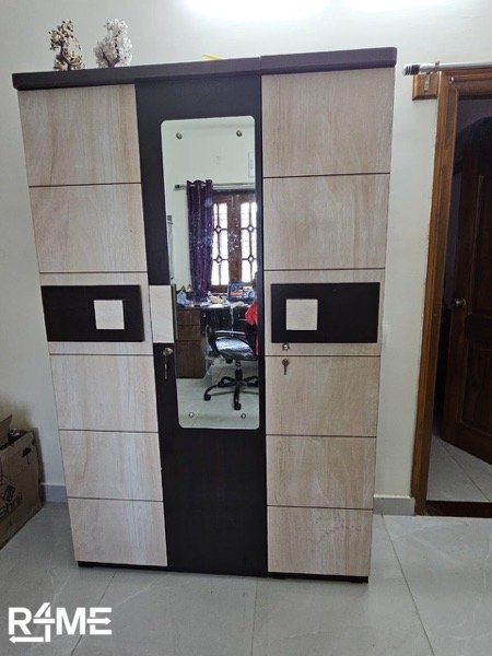 3 door sturdy and spacious wardrobe with mirror on rent