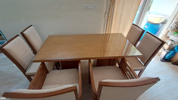 6-seater glass top wooden dining table for rent on rent