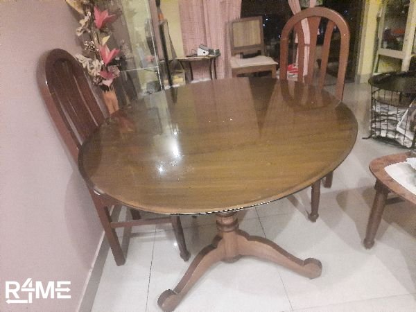 Wooden dining table with chairs available on rent