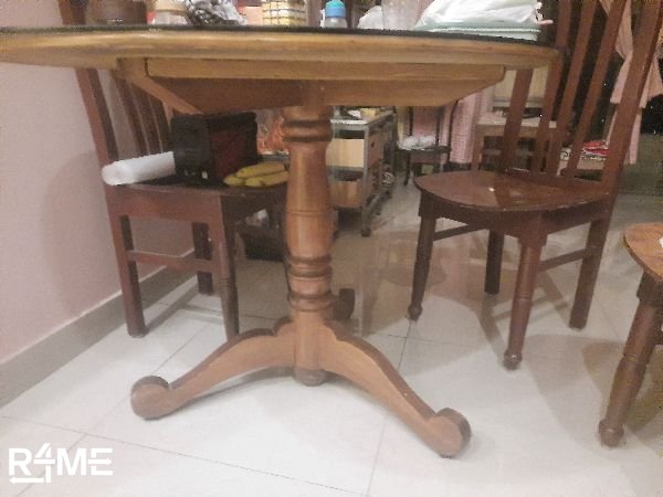 Wooden dining table with chairs available