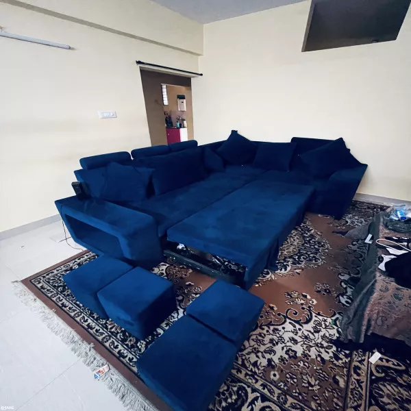 7 Sweater Sofa Cum Bed + 4 Seating Puffies + 6 Cushions on rent