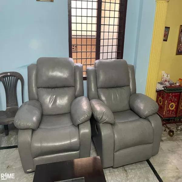 A pair of recliners for half the orginal buying price on rent