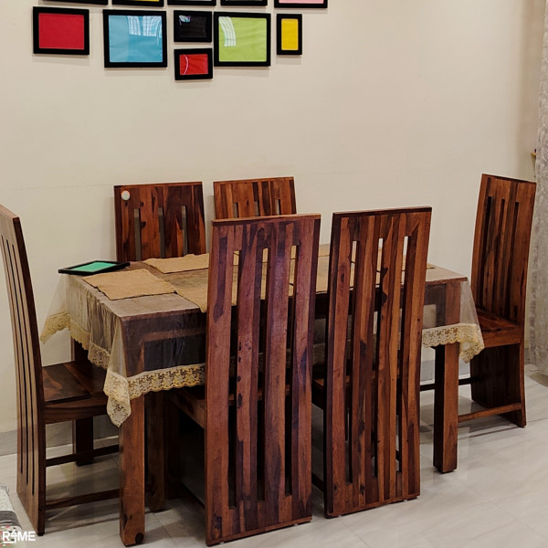 Wooden dining table on rent