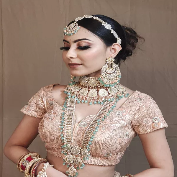 Pastel Green and Golden color Rani set on rent